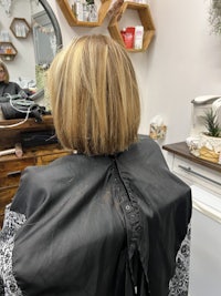 the back of a woman's hair in a salon